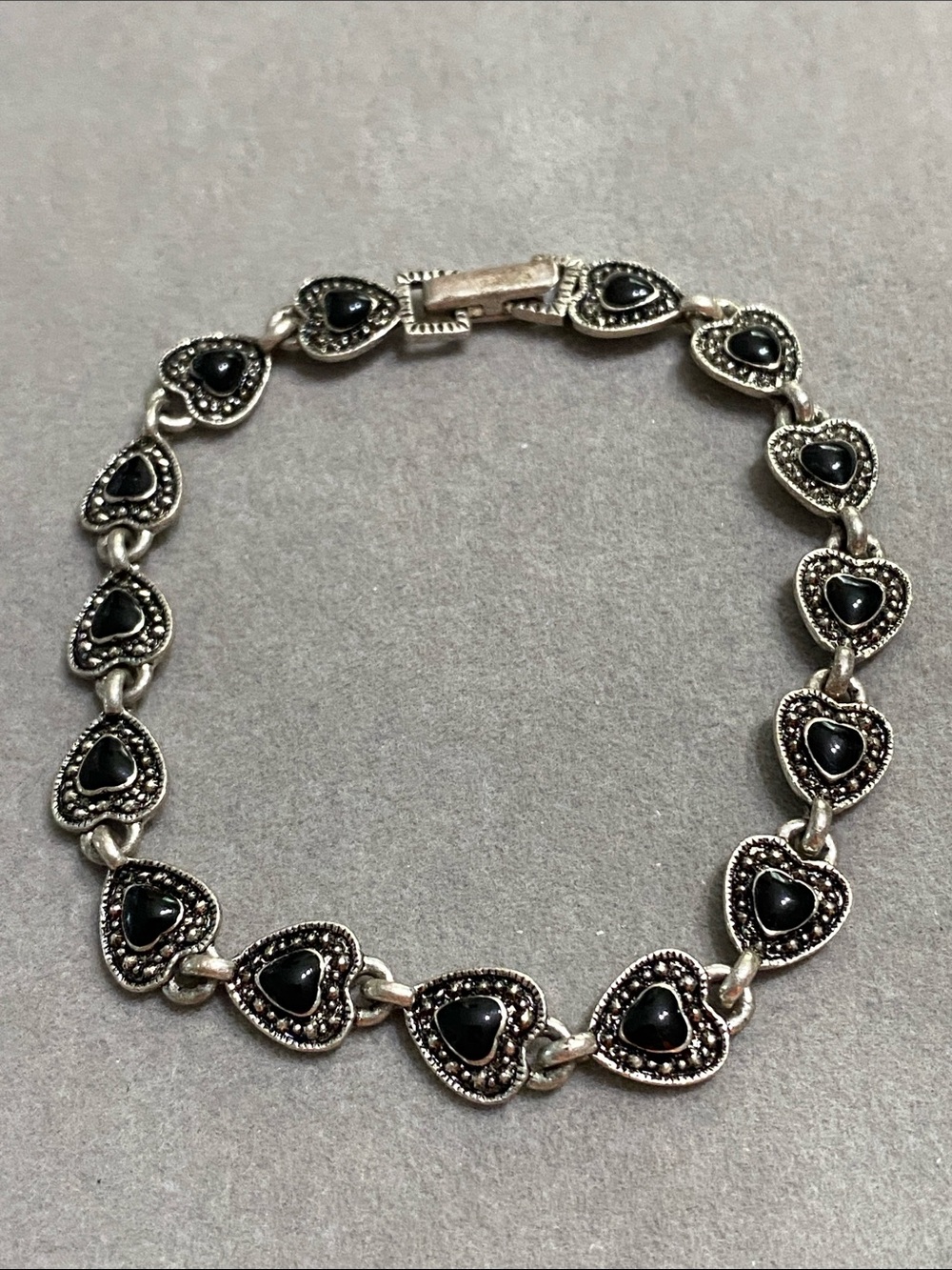 Silver Heart Link Bracelet with Black Onyx Accents